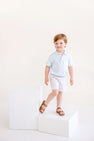 Prim & Proper Polo & Onesie - Buckhead Blue with Bellport Butter Yellow Stork